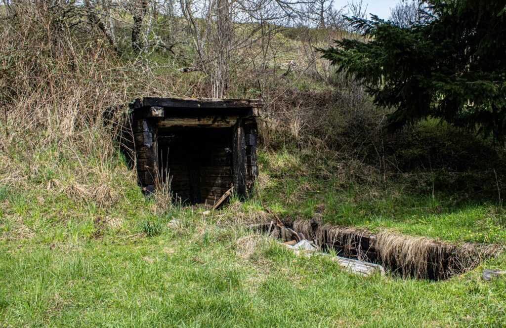 Entrance to an abandoned mine in a hillside